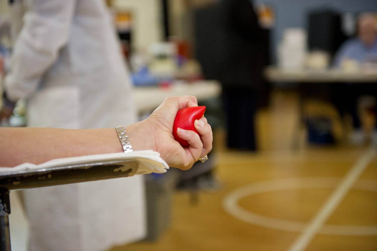 October 20, 2011. Findlay, Ohio. Angela Blair donating blood. Photo by Jason Colston/American Red Cross, Blood Donor and Recipient