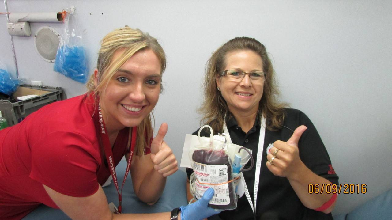 Susan Walling, pictured with American Red Cross collections team member Erica Snow, doesn’t just coordinate blood drives, she’s a regular donor.