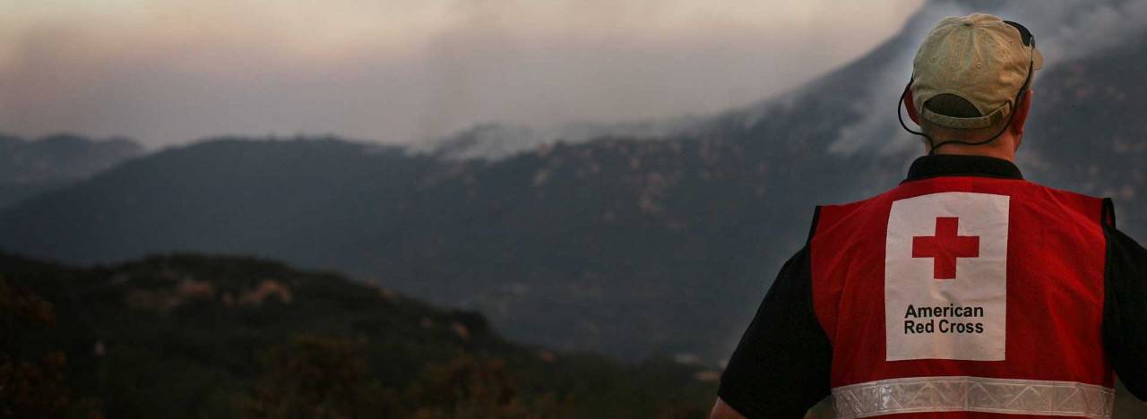 volunteer looking at fire