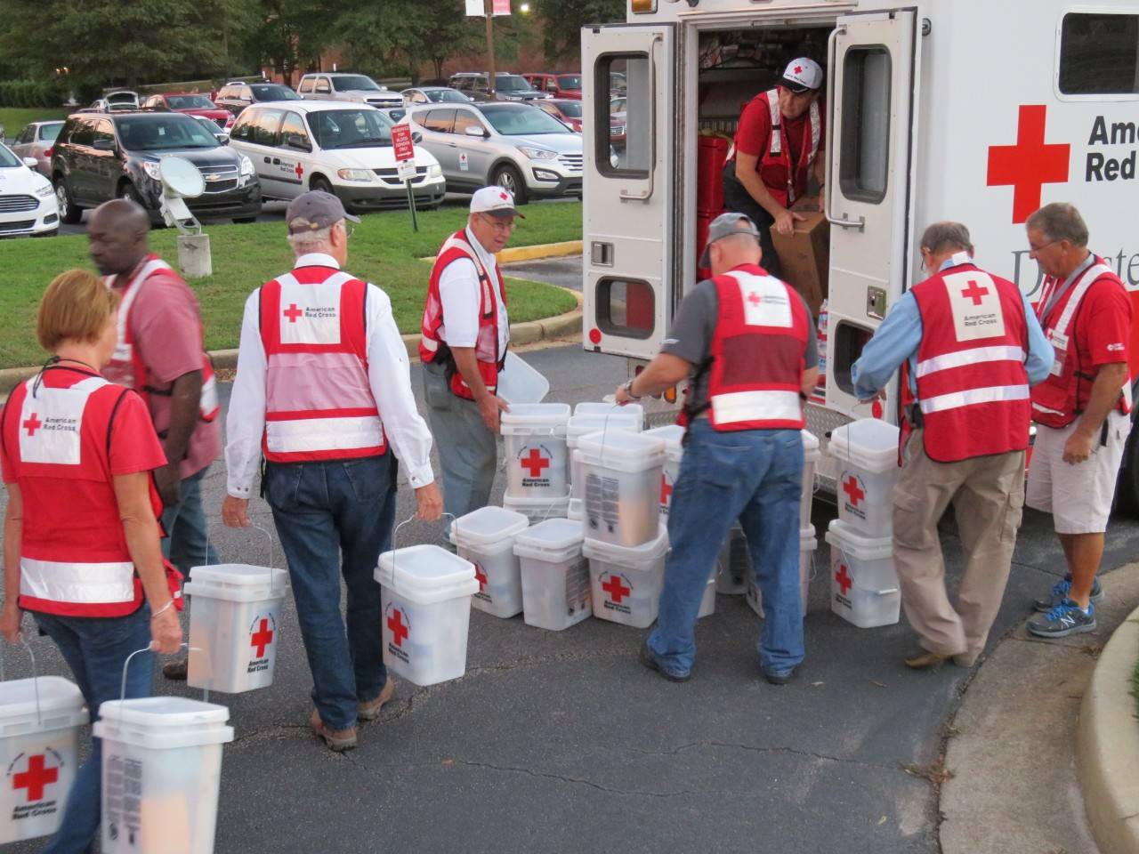 Red Cross volunteers load cleanup kits into an Emergency Response Vehicle for delivery to residents of Myrtle Beach, S.C. (Photo by Carl Manning/American Red Cross)