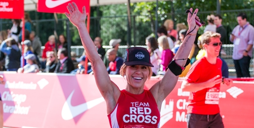marathon runner celebrating at finish line