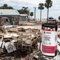 The Deluxe Personal Safety Emergency Pack and an image of a home affected by a disaster.
