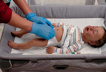 Babysitter's Training student practicing diapering skills.
